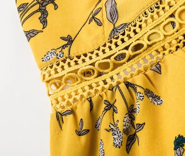 SUNNY SKIES FLORAL ROMPER